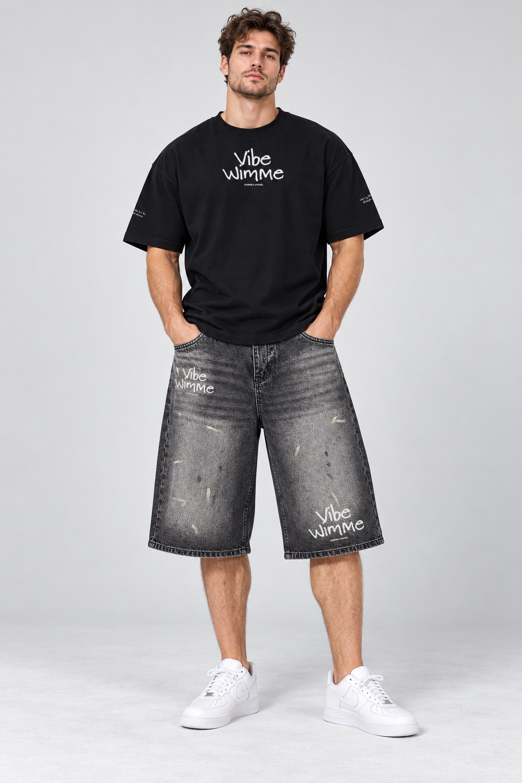 Model wearing Men’s Vintage Wash Wide Leg Denim Shorts
