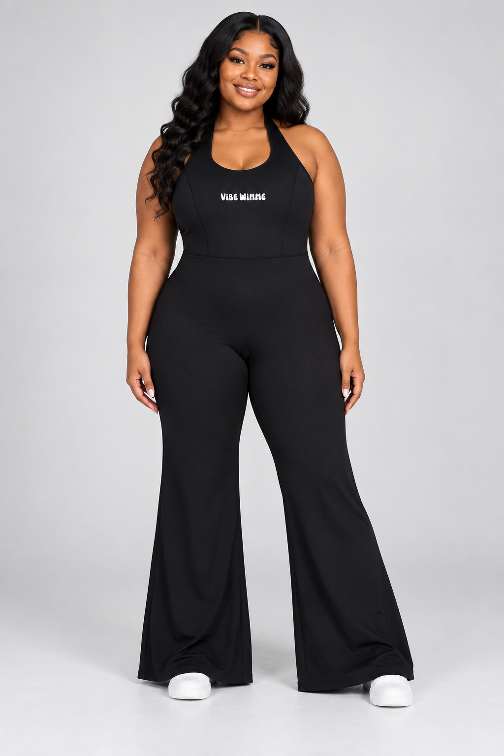 Model wearing Women’s Halter Flared Jumpsuit