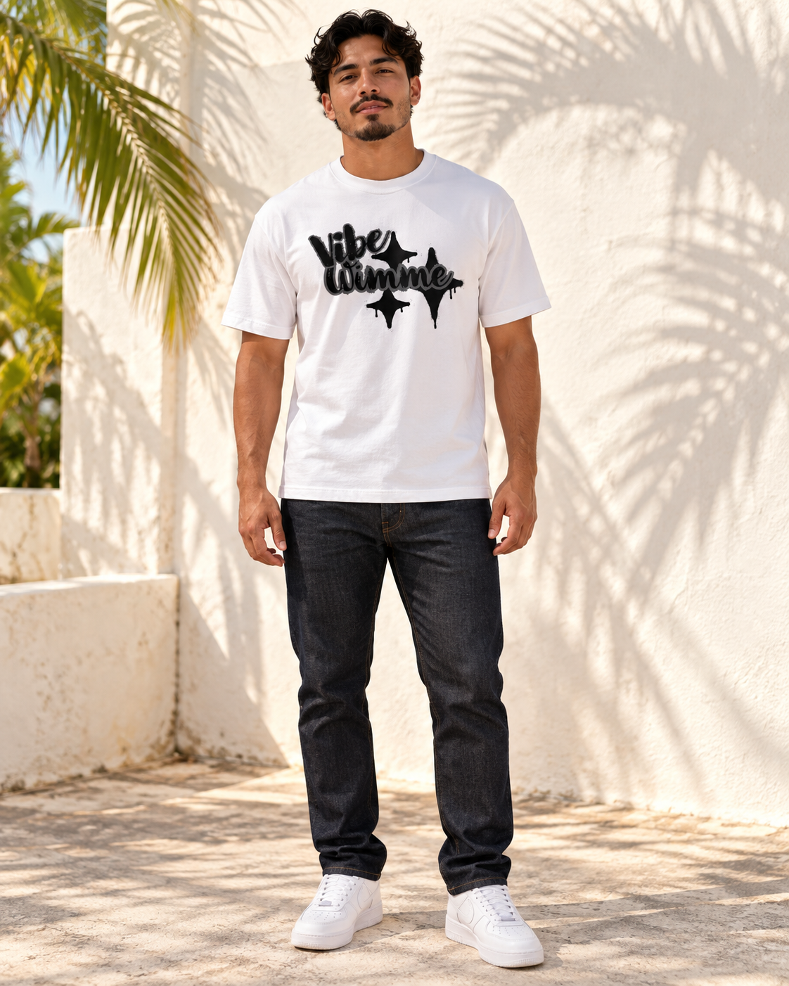 AI model wearing white Vibe Wimme graffiti oversized tee